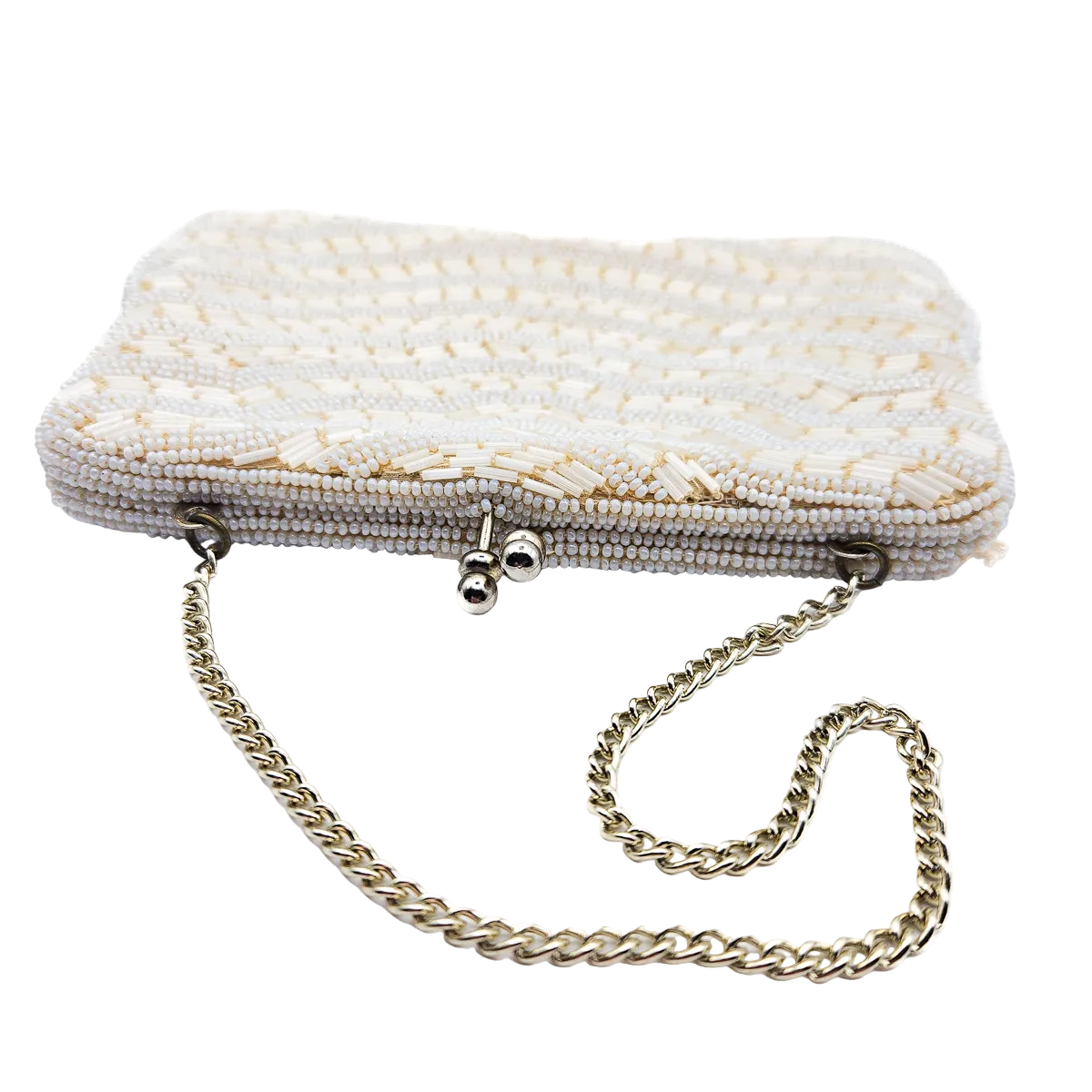 White beaded vintage clutch bag with a chain strap on a white background