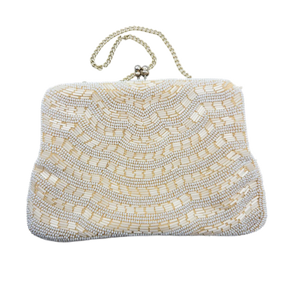 Beaded clutch bag with a chain strap on a white background