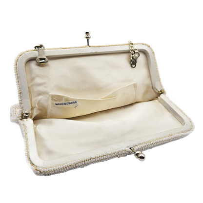 Open satin lined interior view vintage beaded evening bag with made in japan label 
